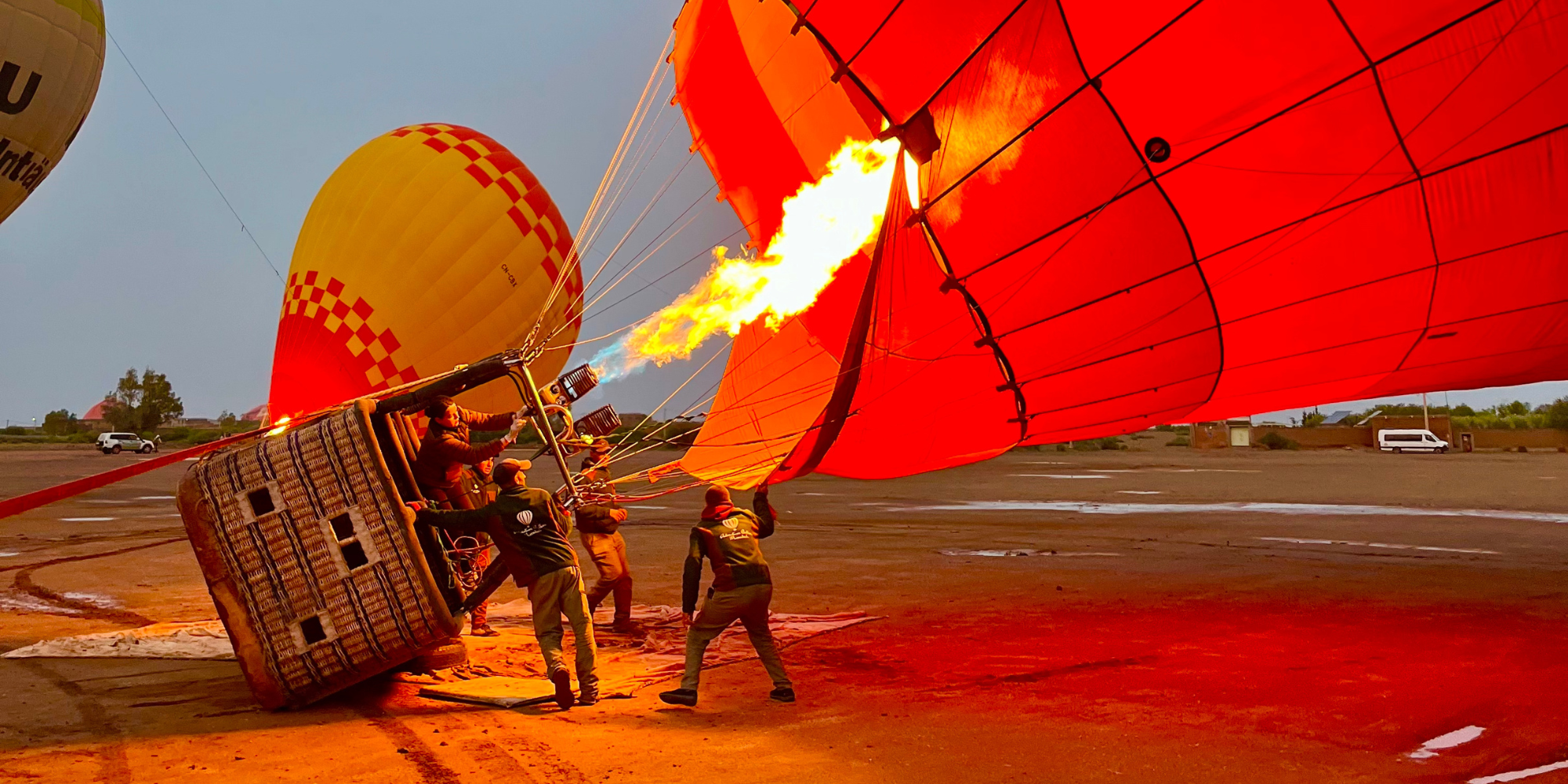 Inflating a Red Hot Air Balloon in Marrakesh, Morocco